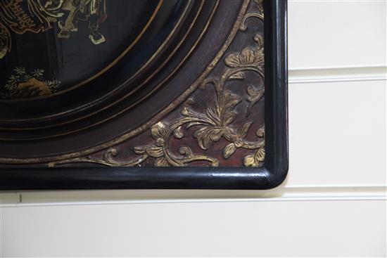 A pair of Chinese gilt-decorated red and black lacquer square panels, 19th century, 45.5cm